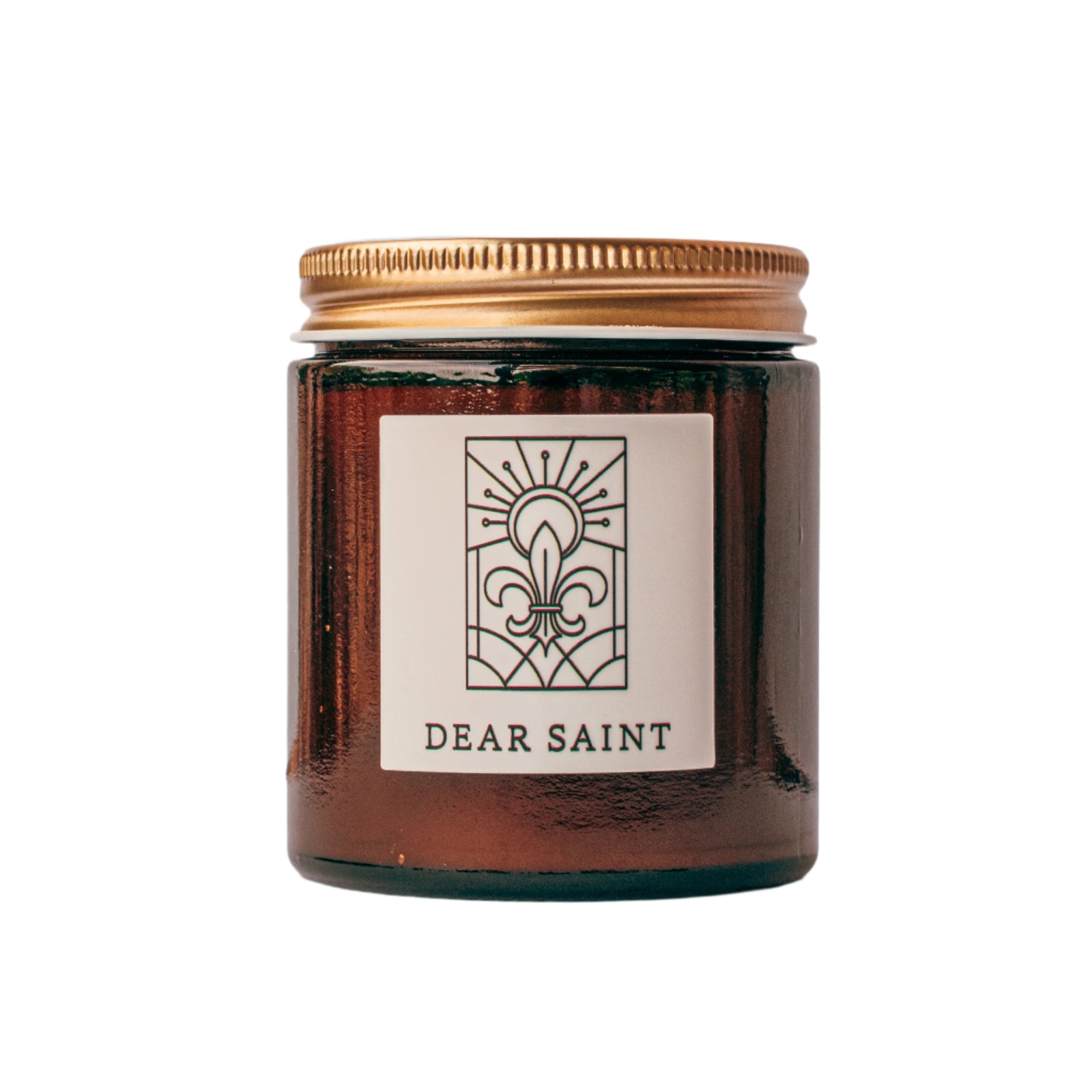 Dear Saint candle in amber jar with gold lid for wholesale through Faire, Bulletin, Shoppe Object, and directly.
