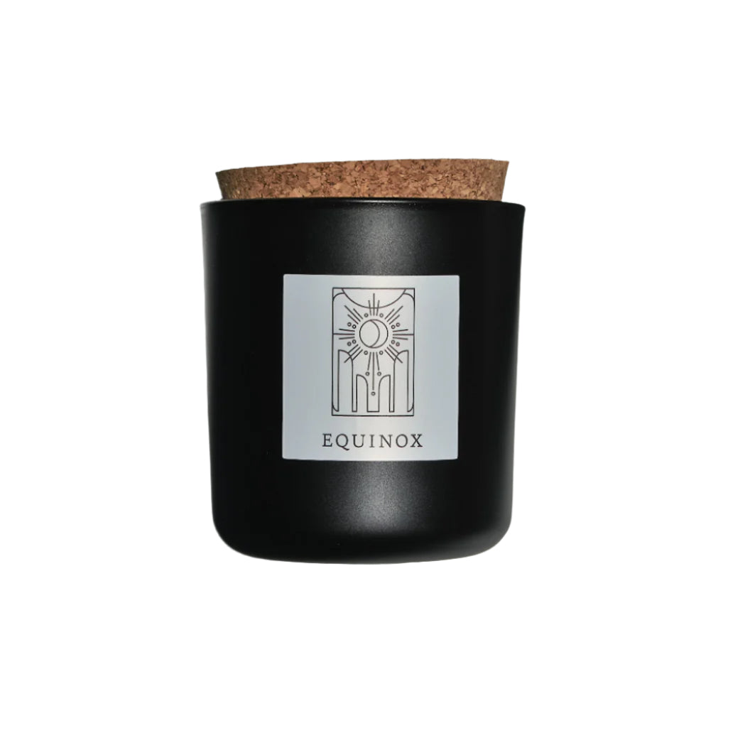 Equinox candle in black apothecary glass with cork top for wholesale through Faire, Bulletin, Shoppe Object, and directly.
