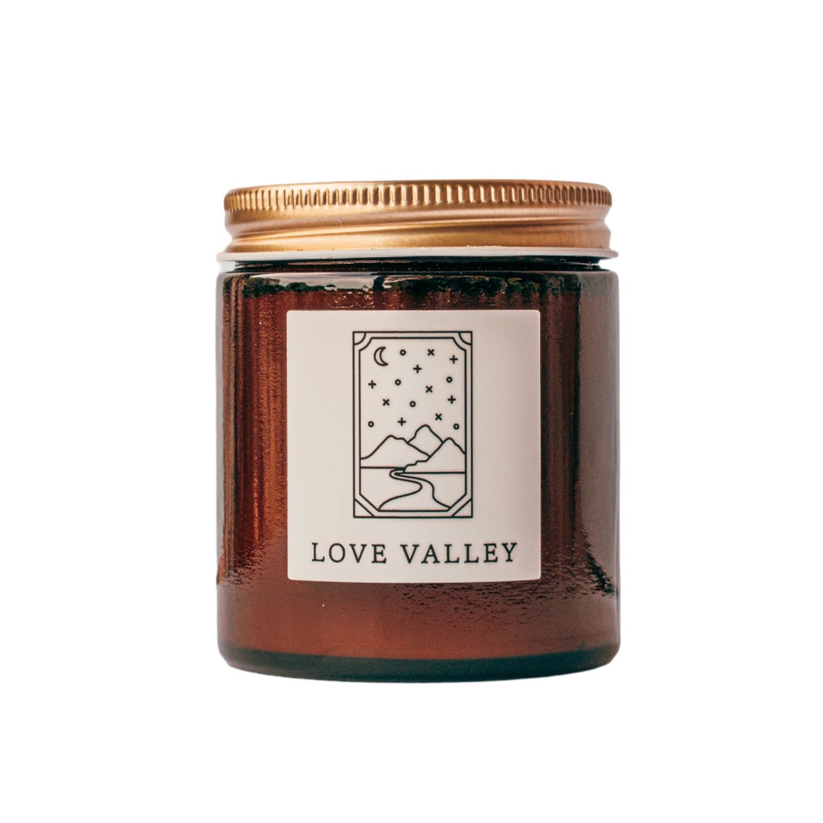 Love Valley candle in amber jar with gold lid for wholesale through Faire, Bulletin, Shoppe Object, and directly.