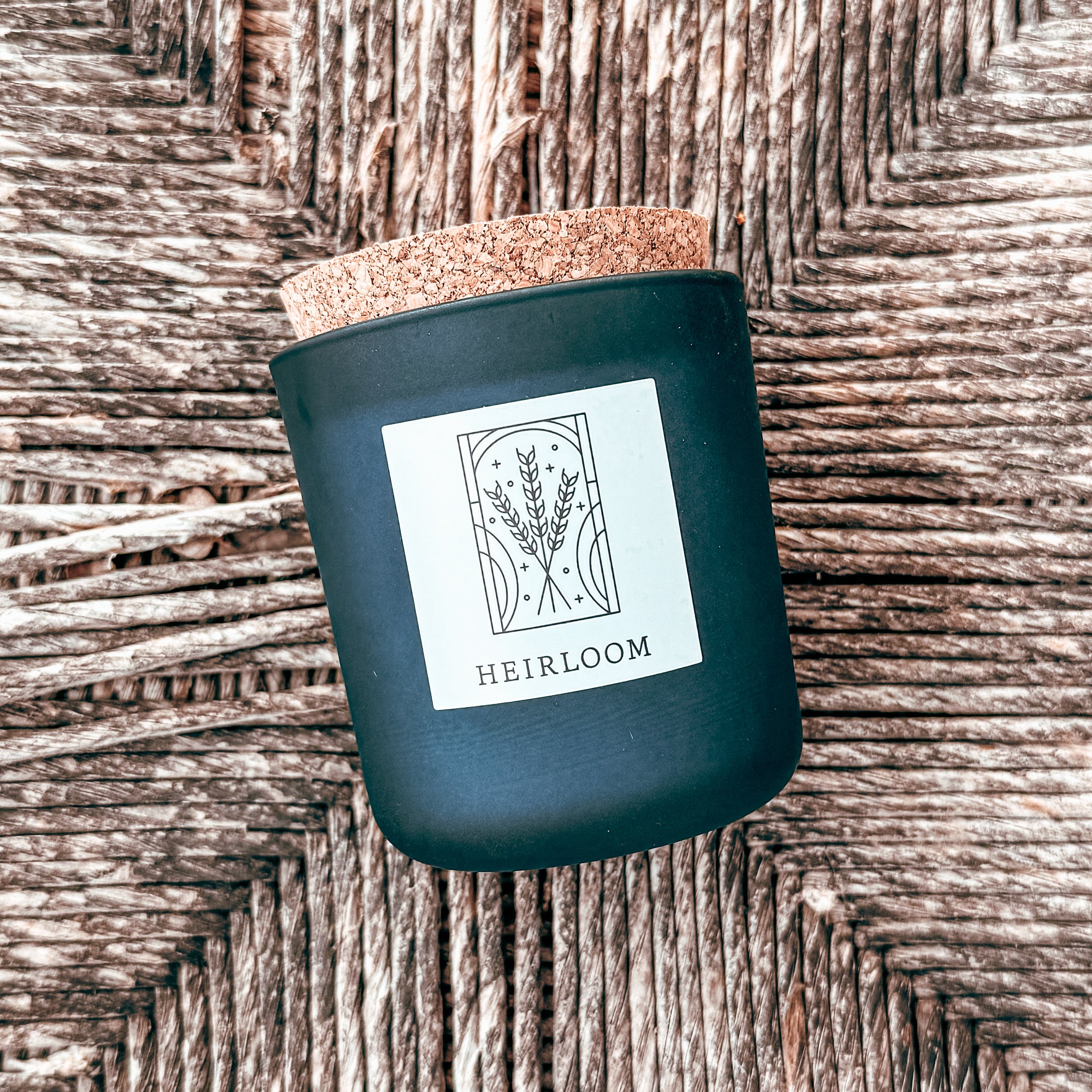 heirloom wheat natural candle in blue frosted glass with cork top